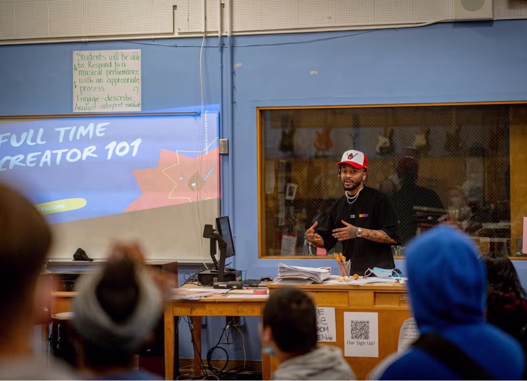 A teacher in front of pupils